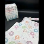 پیشبند ۲لایه نمگیر تاشده ۵۰ عددی برلیان با جنس نایلونی و کش نرم برای استفاده پزشکی.