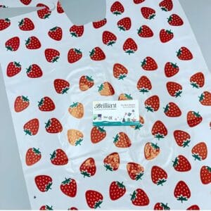 پیشبند اطفال طرحدار توت فرنگی برای استفاده بهداشتی در دندانپزشکی کودکان